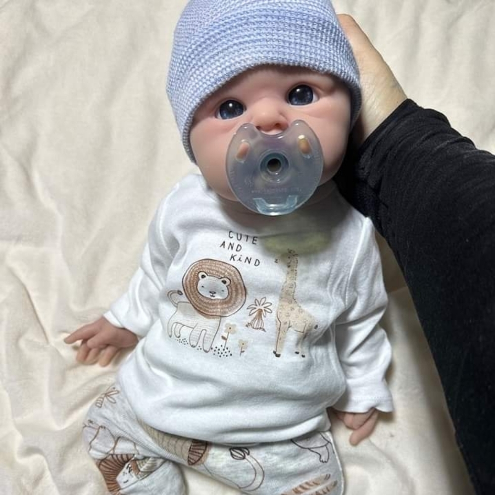 Adorable Baby Doll with Blue Hat